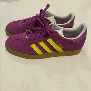 Vibrant Purple Sneakers with Yellow Accents